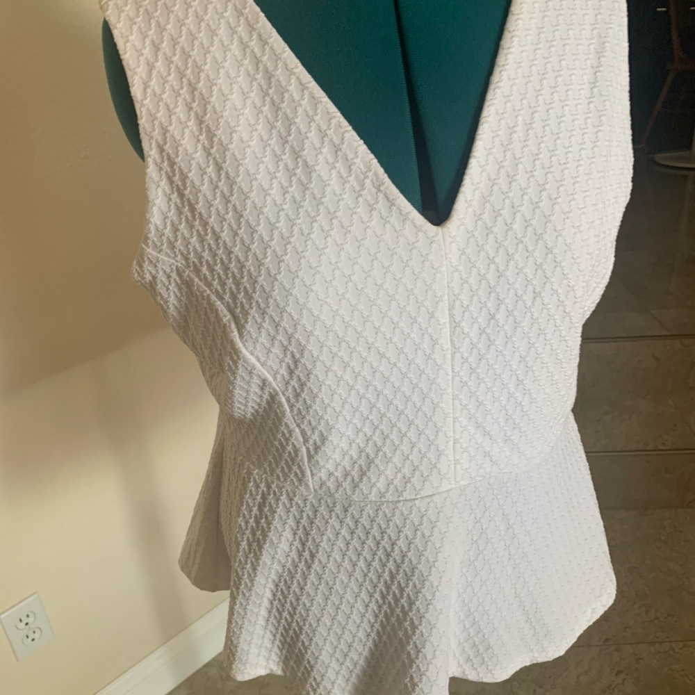 White peplum top